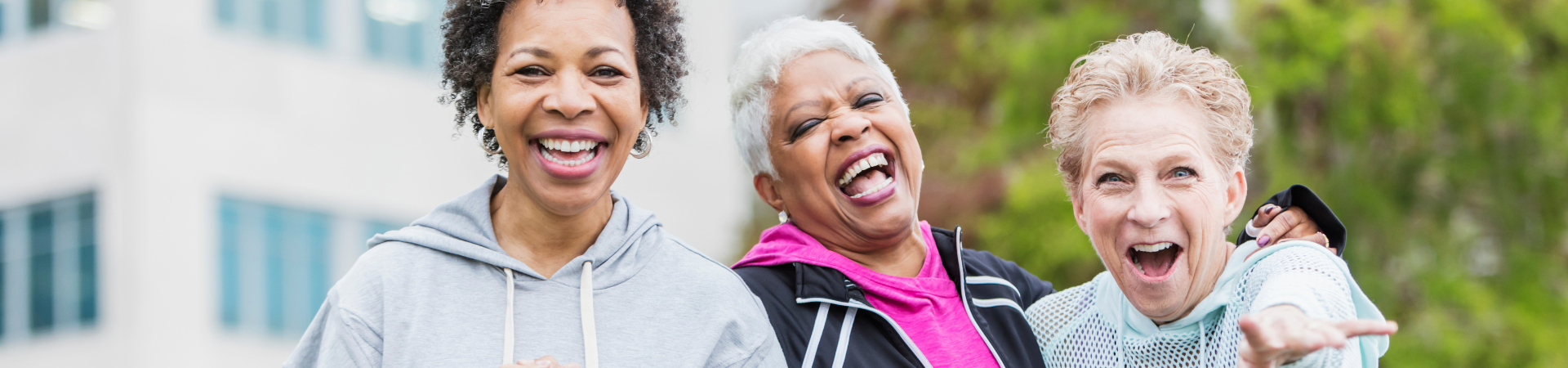  girl scout alum adult women retirement age smiling at camera 